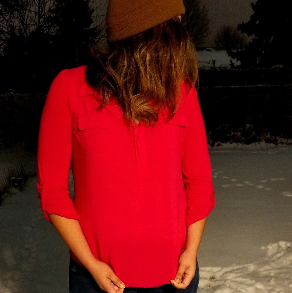 Pink long sleeve blouse with front pockets